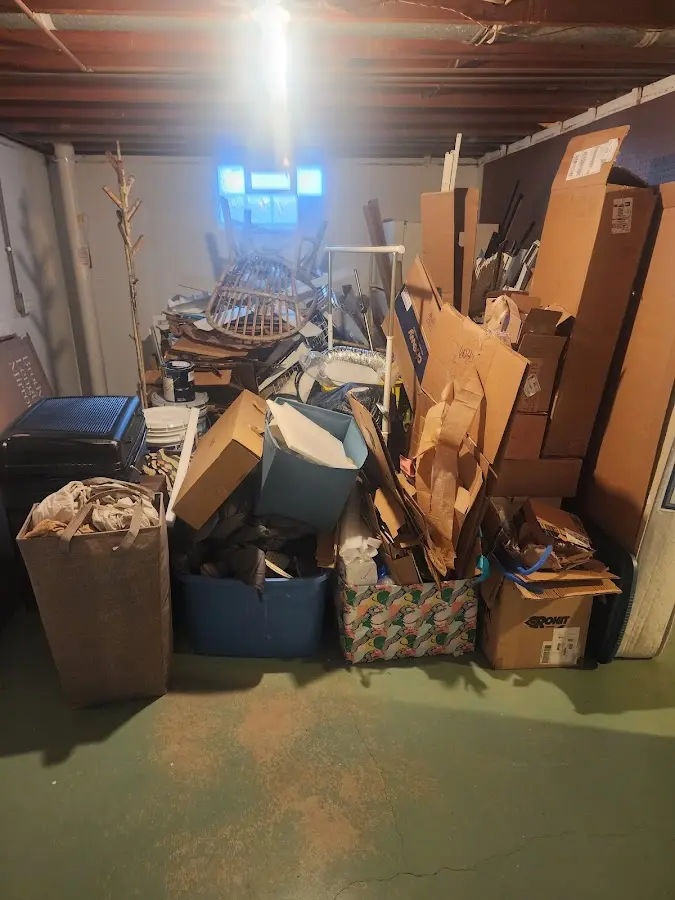 Roll-off dumpster container at job site for 6 Yard Dumpster Rental in Millburn